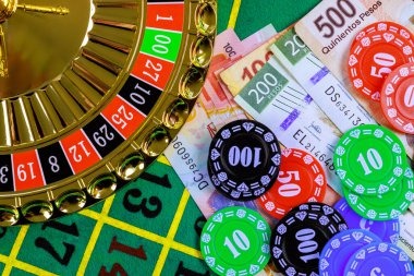 Live Baccarat dealer studio with card shoe and betting layout